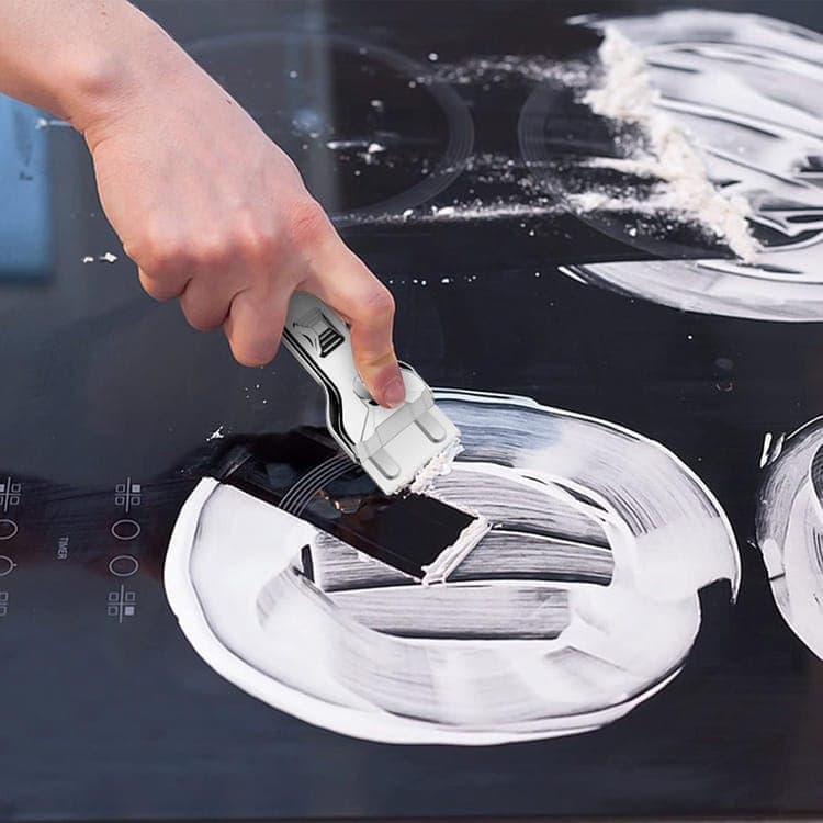 Glass scraper with 5 replaceable blades for effective cleaning, compatible with glass hobs