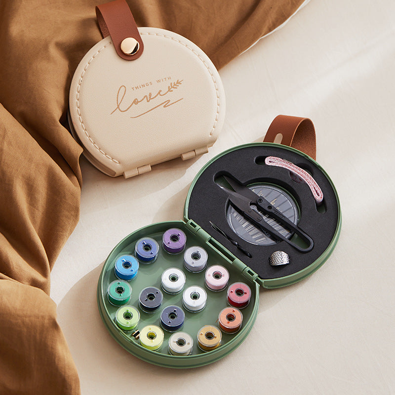 Green Portable Sewing Kit with Threads, Needles, and Tools