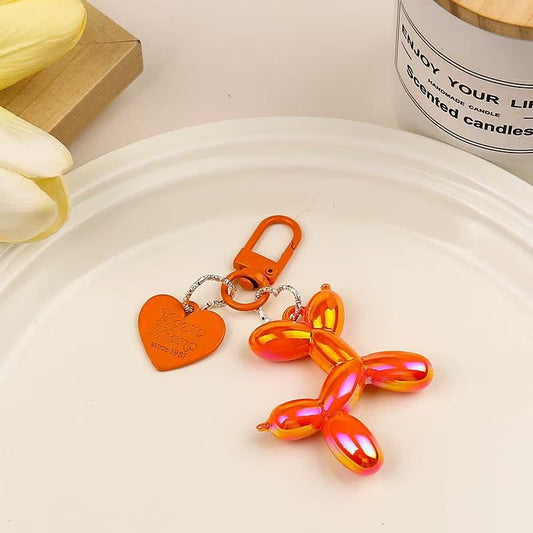 2-Piece Orange Balloon Dog Keychain Set with Heart Charm Bag Pendant